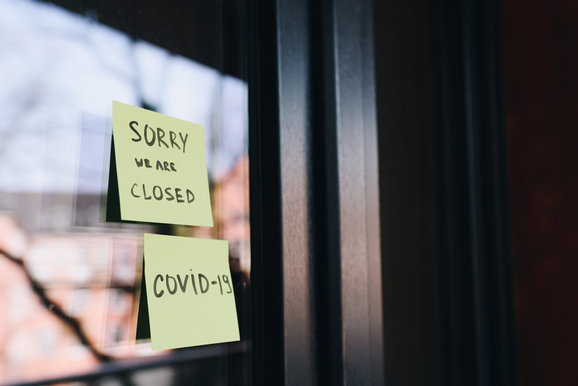 closed shop with covid 19 sign