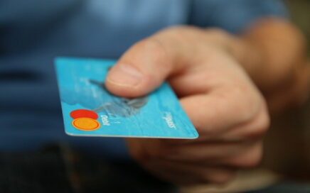 man holding travel money card