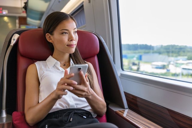 Using a phone on a train
