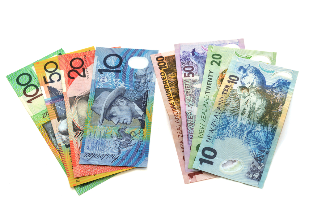 Australian Dollar (AUD) banknotes beside New Zealand Dollar (NZD) bank notes