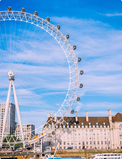 <span>Virtual cards</span> for online and in-store use A red double-decker bus crosses Westminster Bridge in front of the UK’s iconic Houses of Parliament and Big Ben in London on a clear day.