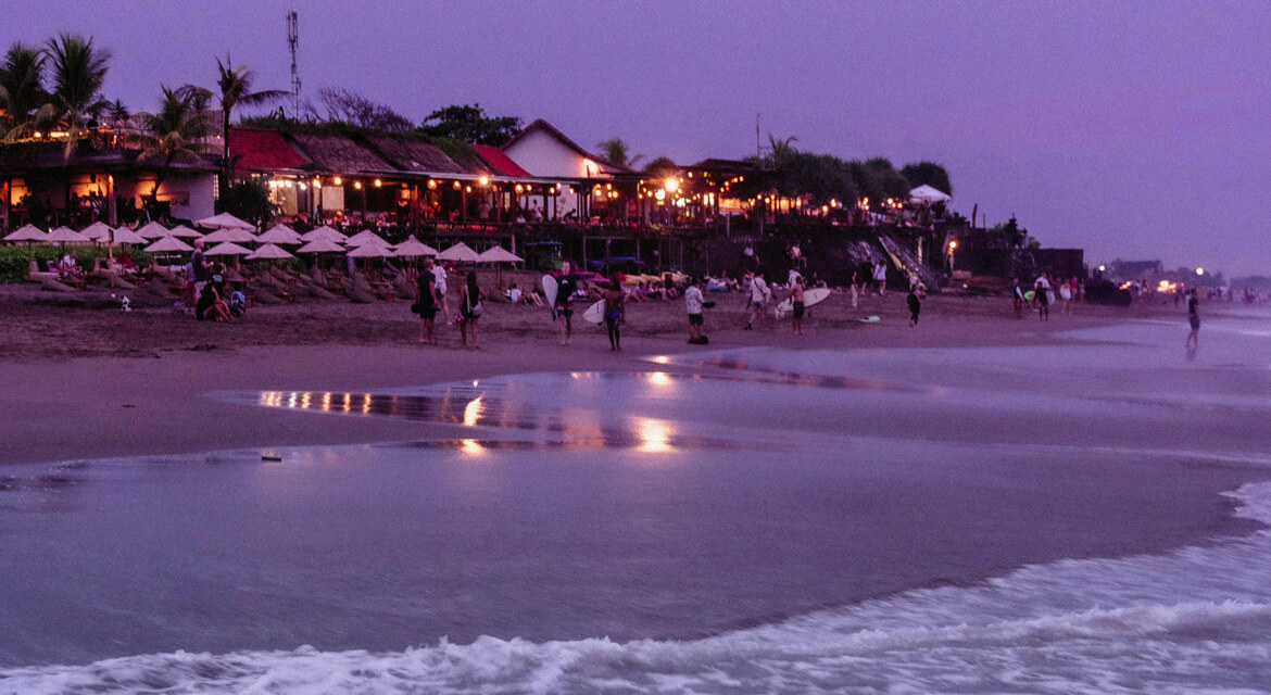 Seminyak Beach at sunset—Bali’s upscale destination for beach clubs, boutique shopping, and oceanfront dining.